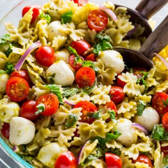 A variety of summer pasta recipes, including a vibrant summer pasta salad with cherry tomatoes, basil, and a light vinaigrette.