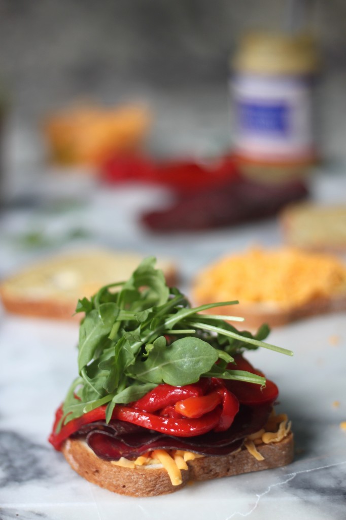 Bresaola, Arugula, and Roasted Red Pepper Cheddar Melts