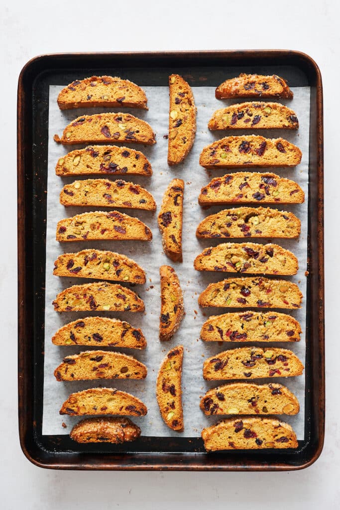 Biscotti baked and golden brown on baking sheet. 