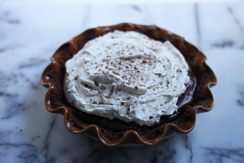 Malted Chocolate Pudding Pie with Chocolate Animal Cracker Crust and Kahlua Whipped Cream