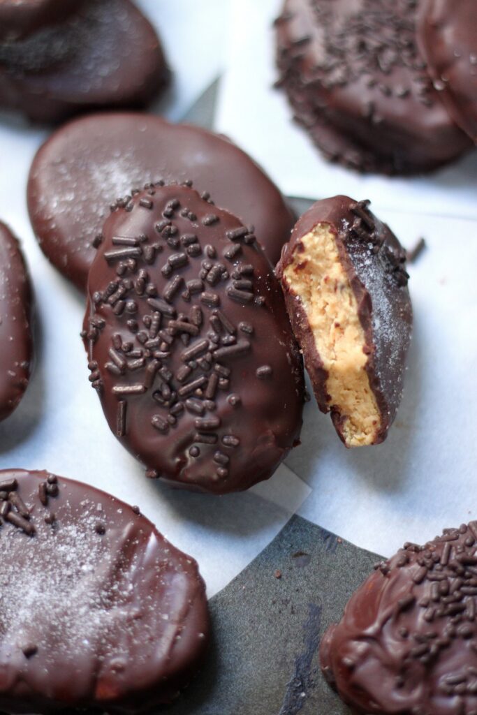 These Homemade Peanut Butter Eggs are sure to be a hit this Easter!!! Made with just a handful of basic ingredients, these salted chocolate covered peanut butter eggs are super easy to whip up! 