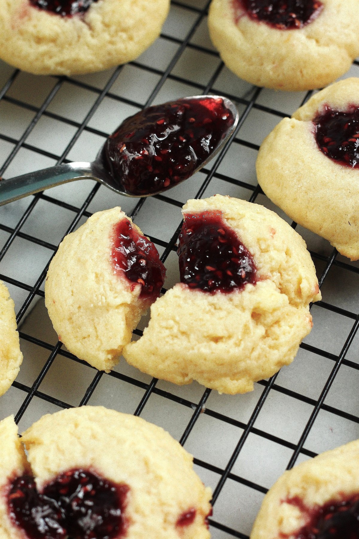 5-Ingredient Raspberry Cheesecake Thumbprint Cookies - Baker by Nature