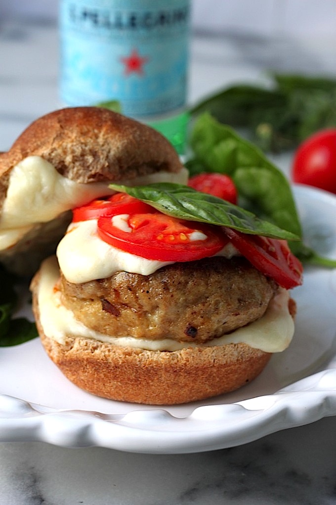 Juicy, flavorful chicken burgers are topped with gooey mozzarella, roasted tomatoes, and fresh basil! These are a hit with everyone :)
