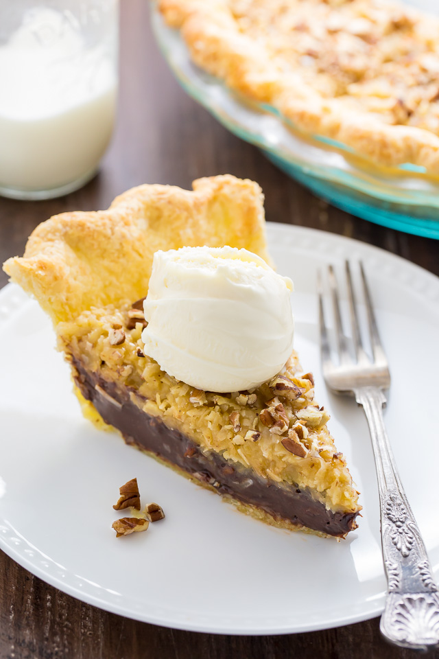 Homemade Chocolate Coconut Pecan Pie! Just one bite will have you hooked.