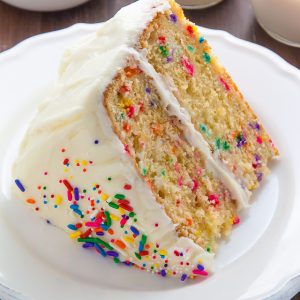 Two layers of brown butter funfetti cake slathered in homemade buttercream frosting! Heaven.