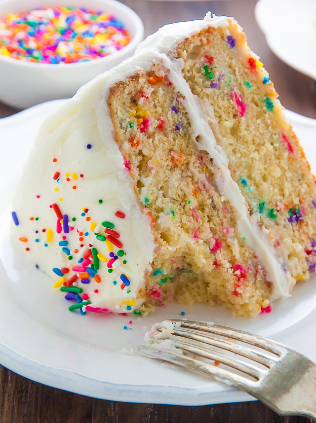 Two layers of brown butter funfetti cake slathered in homemade buttercream frosting! Heaven.