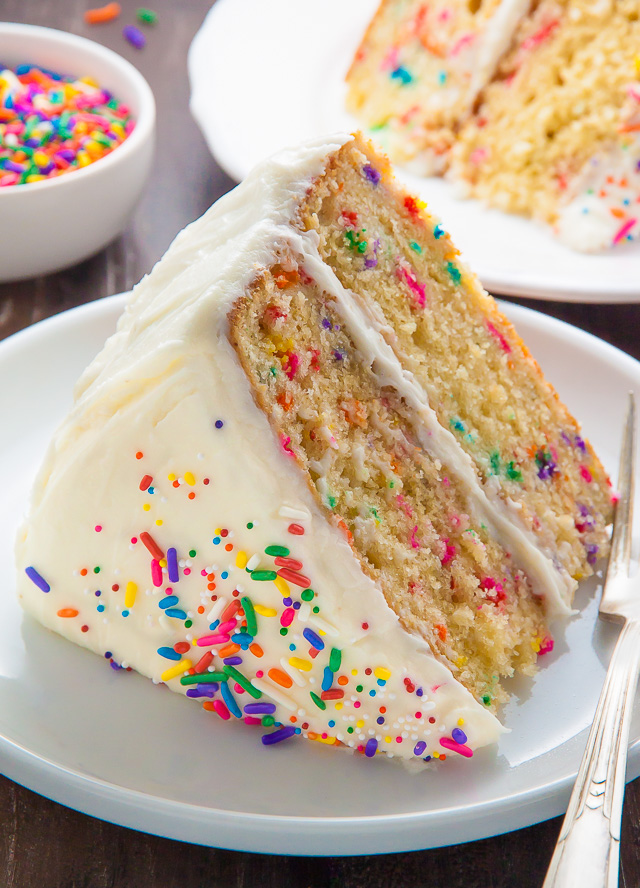 Two layers of brown butter funfetti cake slathered in homemade buttercream frosting! Heaven.