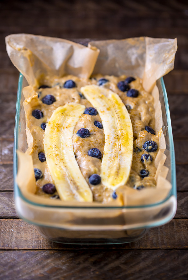 Blueberry banana bread batter in baking pan. 