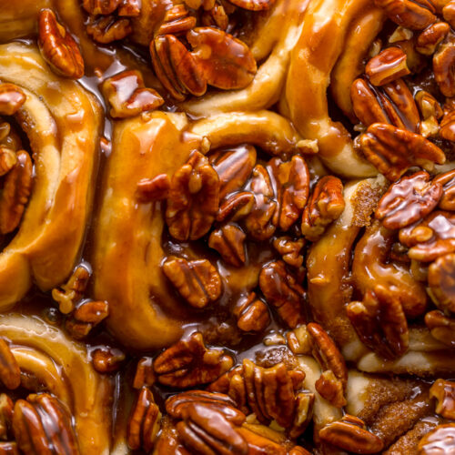 We're butter pecan fanatics, so it only seems fitting that one of our favorite "splurge" breakfast treats are Butter Pecan Cinnamon Buns! They're just like classic cinnamon rolls, but with a TONS of crunchy, gooey, chopped pecans on top. Perfect for Thanksgiving or Christmas morning!