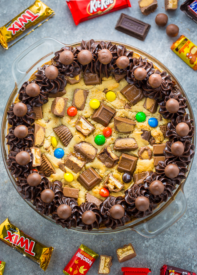 This easy to make Halloween Candy Cookie Cake is the perfect way to use up leftover candy! A hit with kids and adults!