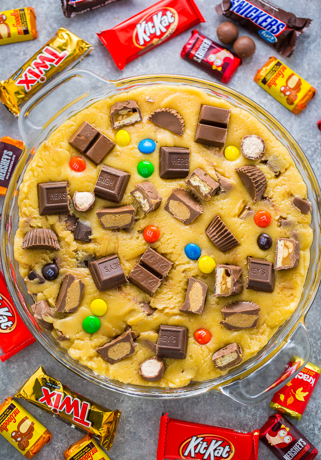 This easy to make Halloween Candy Cookie Cake is the perfect way to use up leftover candy! A hit with kids and adults!