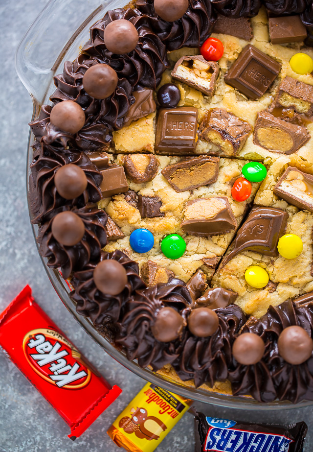 This easy to make Halloween Candy Cookie Cake is the perfect way to use up leftover candy! A hit with kids and adults!