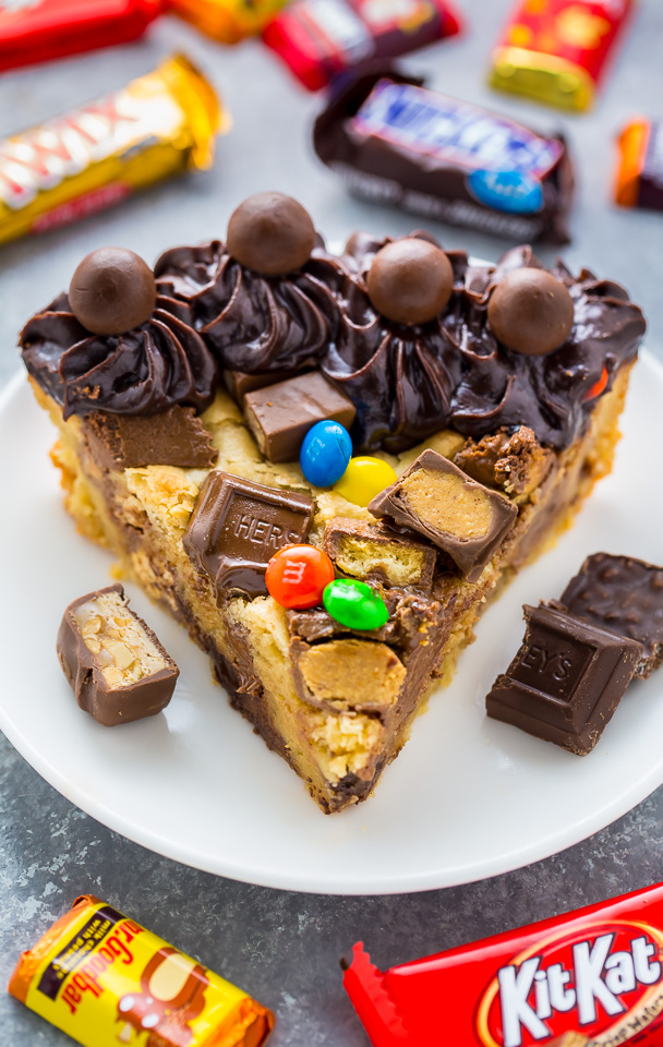 This easy to make Halloween Candy Cookie Cake is the perfect way to use up leftover candy! A hit with kids and adults!