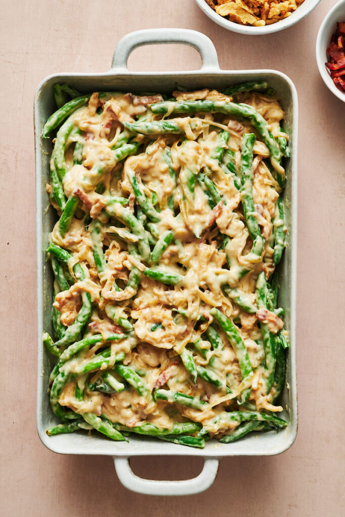 Green beans covered in cheese sauce.