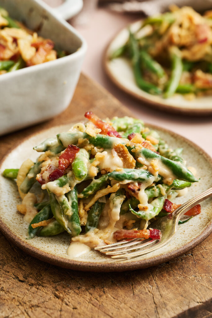 Plate with green bean casserole on it.