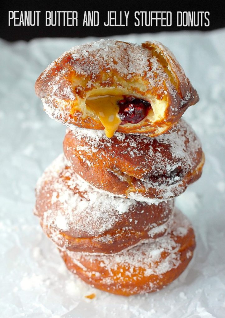 Homemade Donut Recipes - Peanut Butter and Jelly Stuffed Donuts | Homemade Recipes http://homemaderecipes.com/holiday-event/14-life-changing-homemade-jelly-donut-recipes