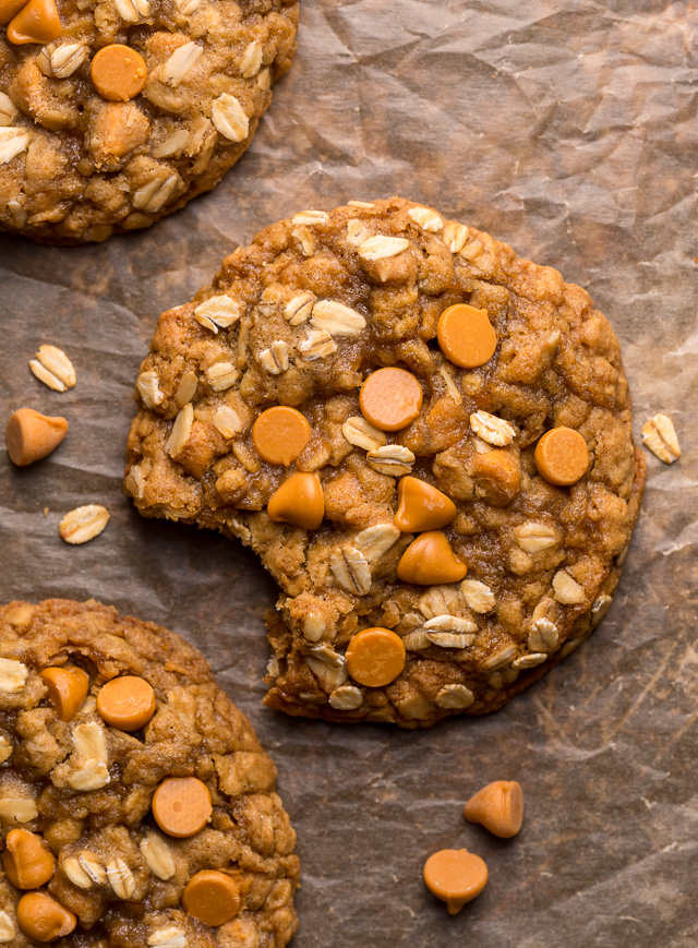 These delightfully soft and chewy oatmeal scotchies are exploding with oats and butterscotch chips! A touch of orange zest and a drizzle of molasses take this from a good recipe to a great recipe! No chilling required, so preheat your oven to 350 degrees and jump to the recipe!