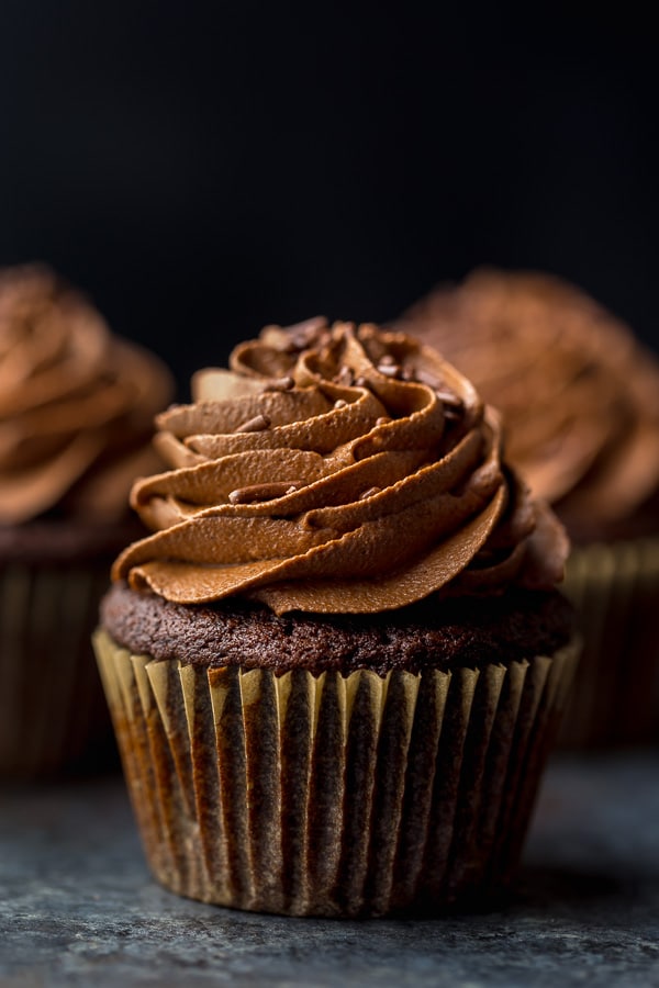 Homemade chocolate cupcakes are rich, moist, and come together in just one-bowl. Topped with a decadent chocolate buttercream - these cupcakes are as good as it gets!