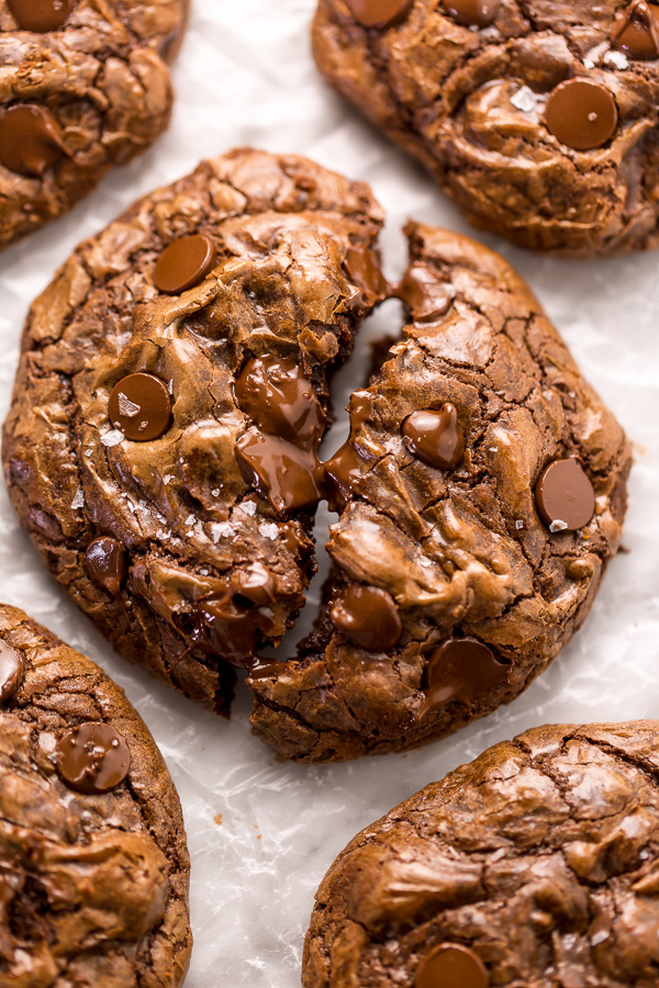 Chocolate Fudge Cookies on white parchment paper.