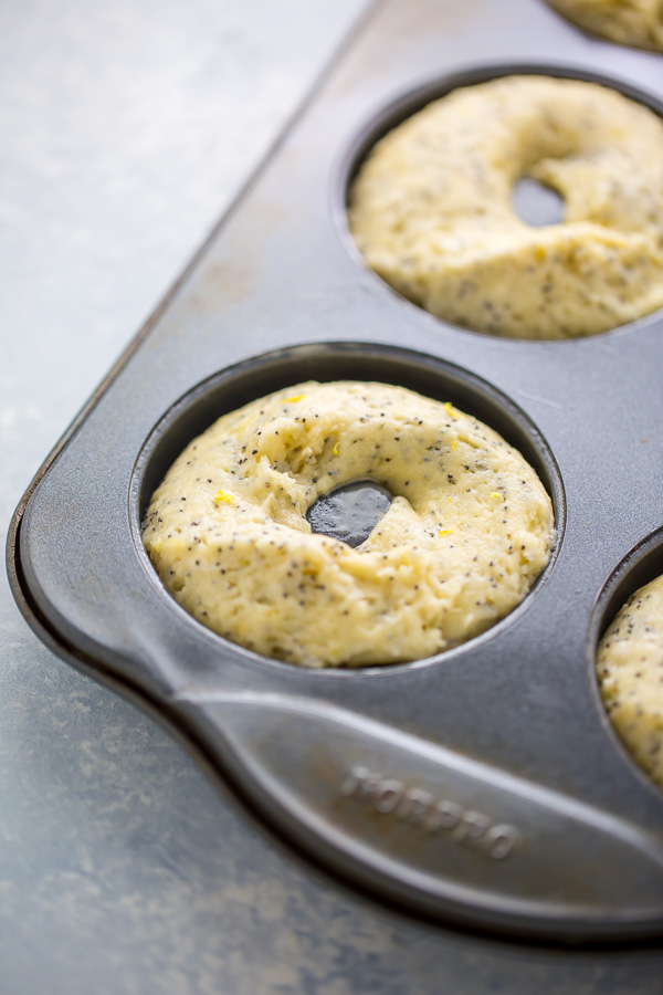 Homemade Lemon Poppy Seed Donuts are soft, fluffy, and sunshiny sweet! Baked, not fried, this recipe is ready in just 20 minutes. 