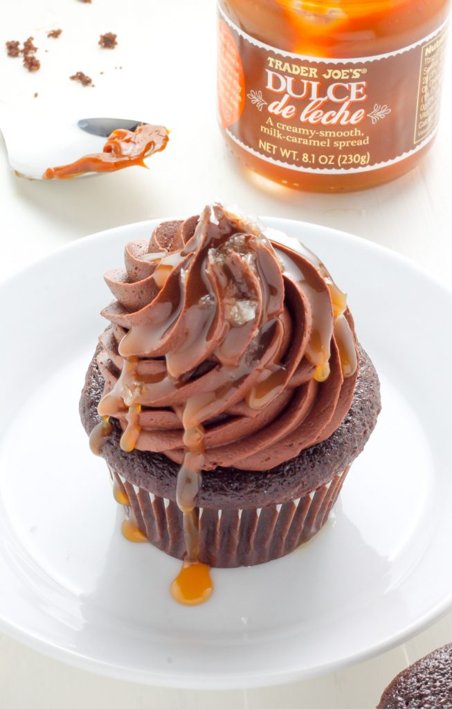 What's better than a batch of chocolate cupcakes...?! A batch of Dulce De Leche Chocolate Cupcakes! This SUPER decadent recipe is sure to become a new favorite.