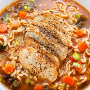 Hearty and Healthy, this Blackened Chicken Ramen Noodle Soup is loaded with carrots, kale, and a TON of flavor! Make this the next time you're craving cozy comfort food - it does the trick every time.