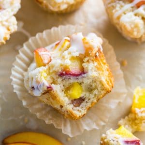 These moist and fluffy Peaches and Cream Muffins are sure to make you weak at the knees!