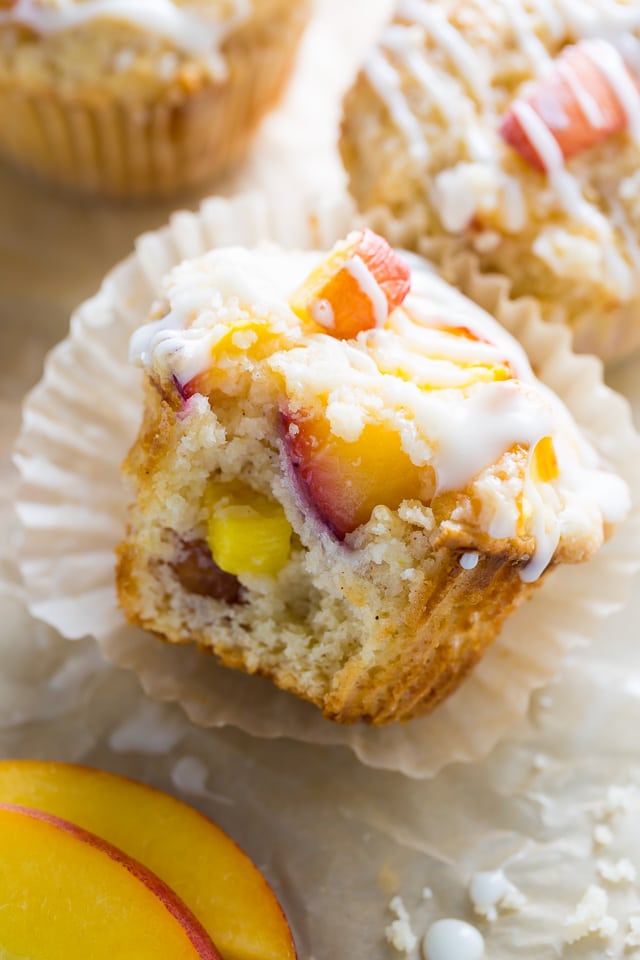 These moist and fluffy Peaches and Cream Muffins are sure to make you weak at the knees!