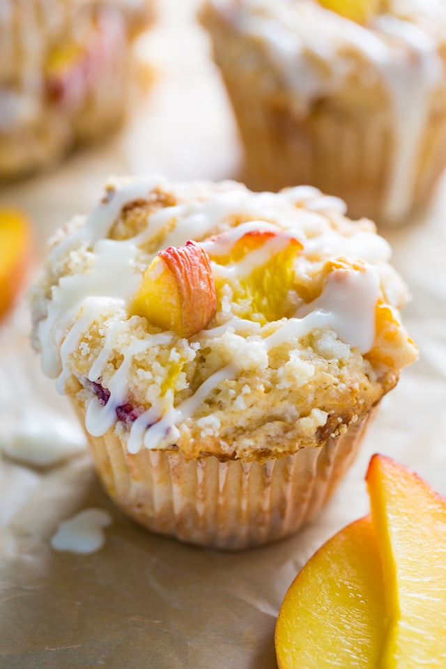 These moist and fluffy Peaches and Cream Muffins are sure to make you weak at the knees!