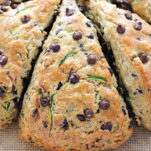 Chocolate Chip Zucchini Scones - Buttery Scones on baking pan.