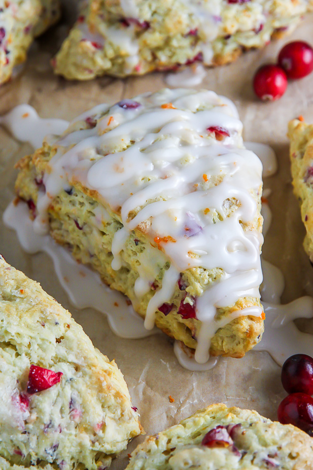 Homemade Cranberry Ricotta Scones feature supremely soft centers, crunchy tops, and a sweet orange glaze.