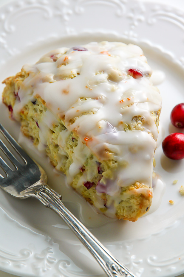 Homemade Cranberry Ricotta Scones feature supremely soft centers, crunchy tops, and a sweet orange glaze.