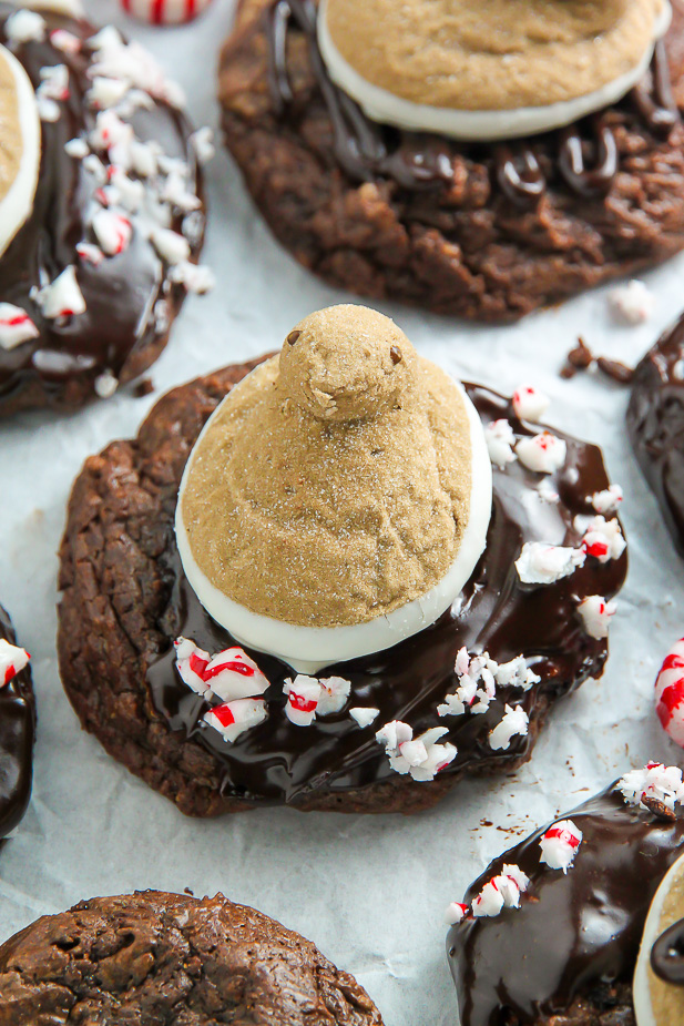 You're going to love these Peppermint Hot Chocolate Cookies! Topped with a drizzle of rich chocolate ganache, a sprinkle of crushed candy canes, and a hot cocoa and cream flavored peeps marshmallow.