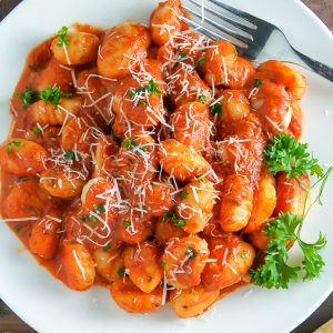 Soft pillows of potato gnocchi coated in a rich tomato vodka sauce.