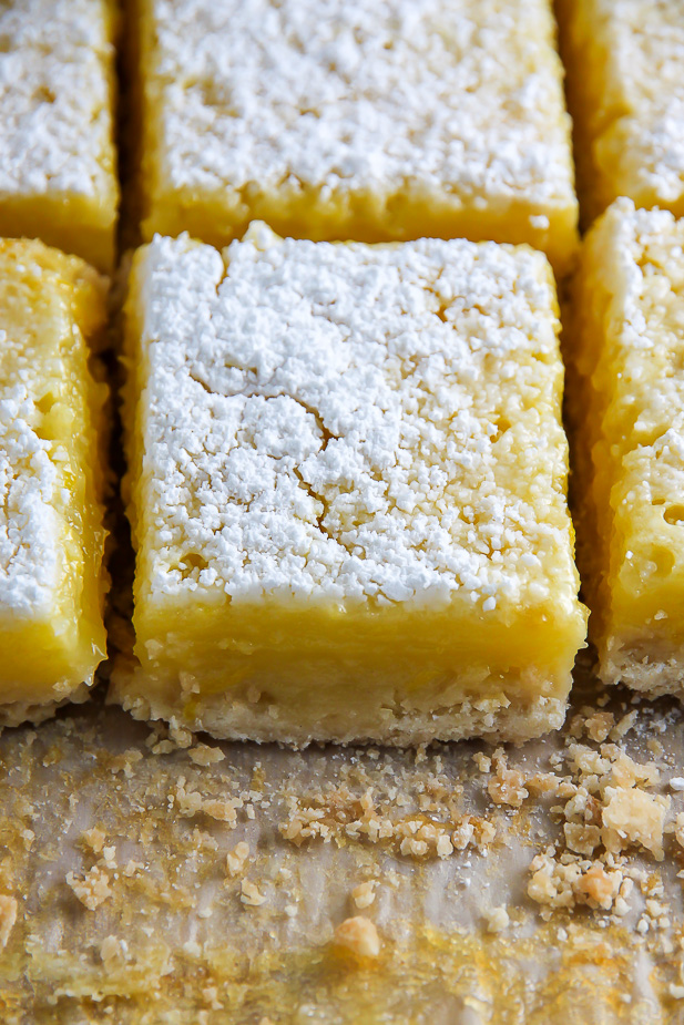 Sunny Lemon Squares feature a crunchy coconut crust, creamy lemon filling, and sprinkle of sweet sugar on top. YUM.
