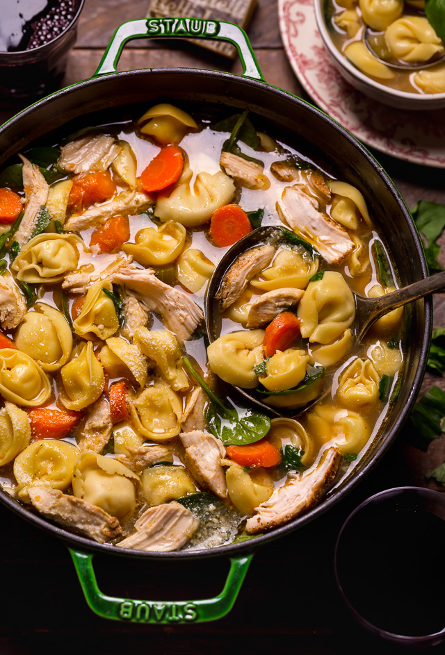 Nothing screams cozy like a giant bowl of Italian Chicken Tortellini Soup! Loaded with tender cheese tortellini, shredded chicken, fresh baby spinach, carrots, and celery... all in a super flavorful chicken broth! Serve this family favorite with extra parmesan cheese and crusty bread.