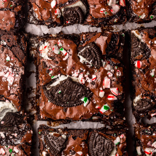 Oreo Peppermint Mocha Brownies are thick, fudgy, and a must bake this holiday season! Loaded with chocolate and peppermint flavor, these Oreo Brownies are sure to elevate any cookie platter or dessert tray! Top with chopped candy canes and Oreo pieces for any extra pretty presentation!