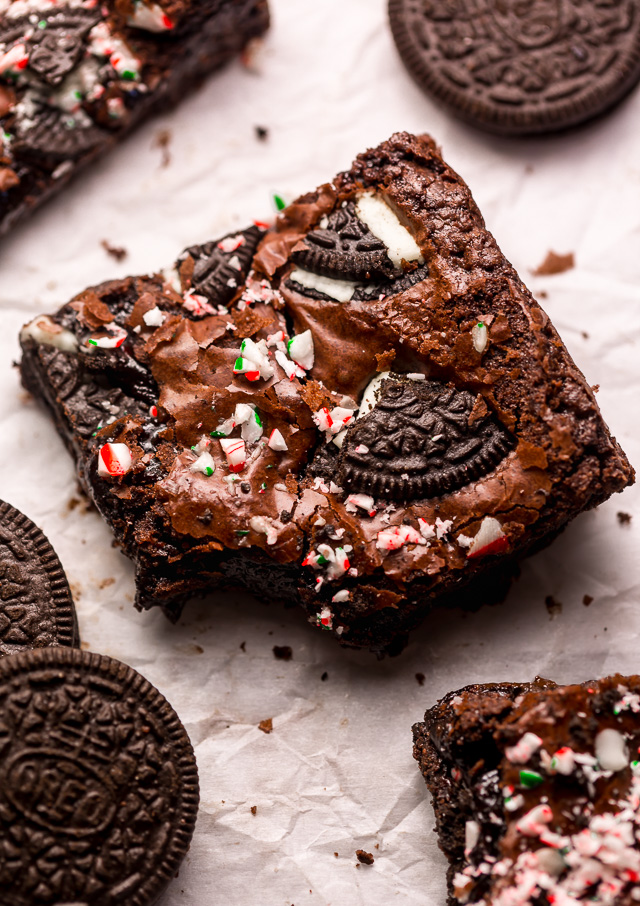 Oreo Peppermint Mocha Brownies are thick, fudgy, and a must bake this holiday season! Loaded with chocolate and peppermint flavor, these Oreo Brownies are sure to elevate any cookie platter or dessert tray! Top with chopped candy canes and Oreo pieces for any extra pretty presentation!