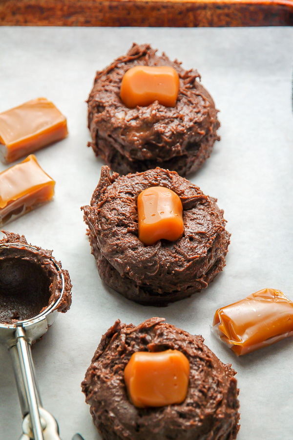 Soft Batch Chocolate Fudge Cookies with a gooey pocket of salted caramel inside! Pure decadence.