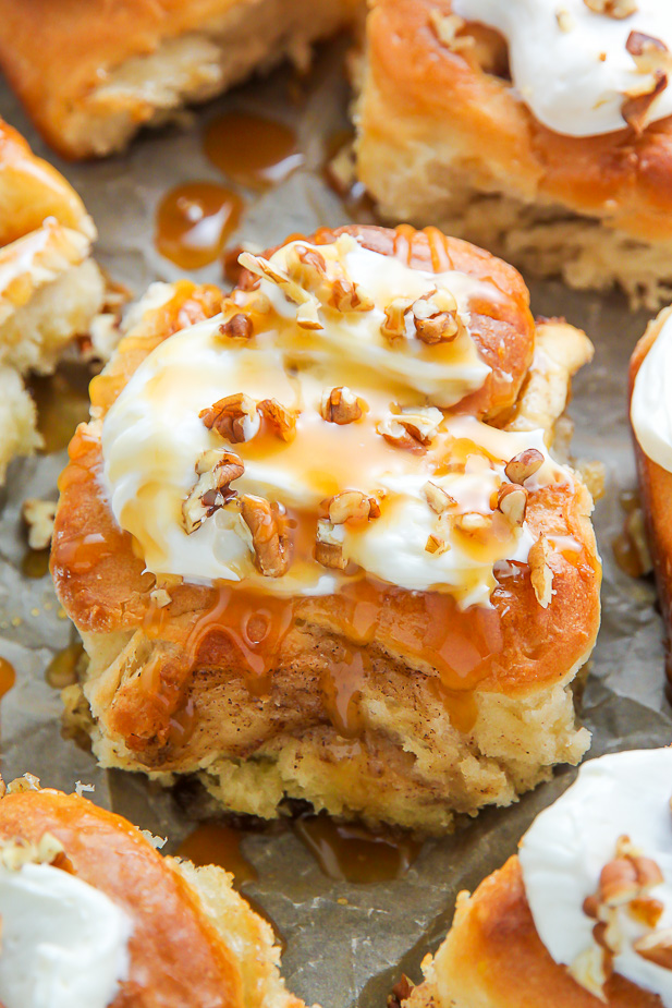 Soft and fluffy homemade cinnamon buns topped with salted caramel and cream cheese frosting!
