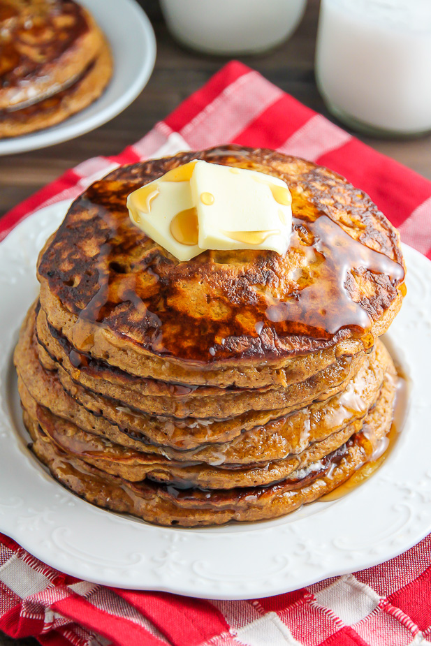 Moist and fluffy Gingerbread Pancakes made with whole wheat flour and a subtle amount of sugar! We love these.