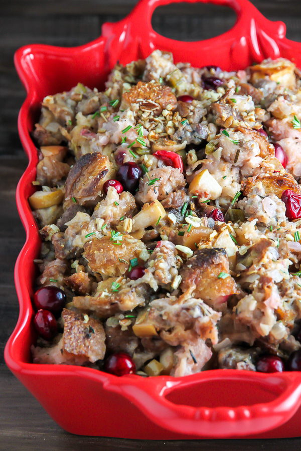My go-to holiday stuffing recipe loaded with fresh herbs, chopped apples, cranberries, and sausage! Bonus: This recipe can be made ahead to help you save time.