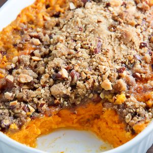 Creamy sweet potato casserole topped with crunchy brown sugar and almond streusel.