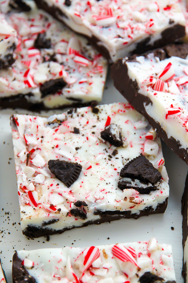 Layered peppermint chocolate bark topped with crushed candy canes and Oreo cookies!