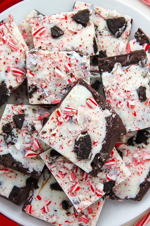 Layered peppermint chocolate bark topped with crushed candy canes and Oreo cookies!