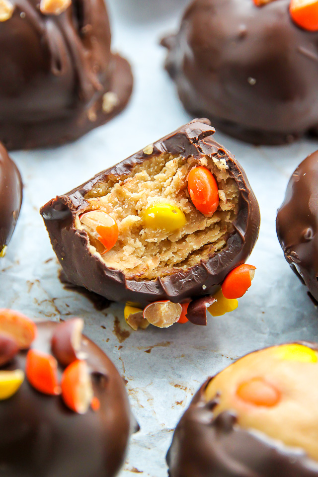 Creamy and crunchy chocolate peanut butter truffles loaded with mini Reese's pieces.