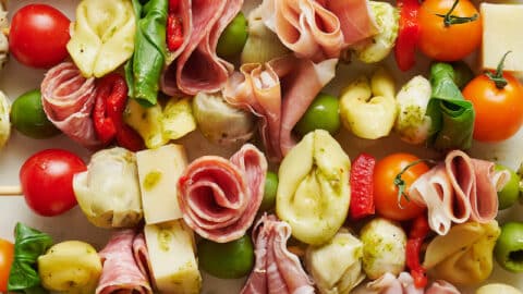 Antipasto skewers on a large serving platter.