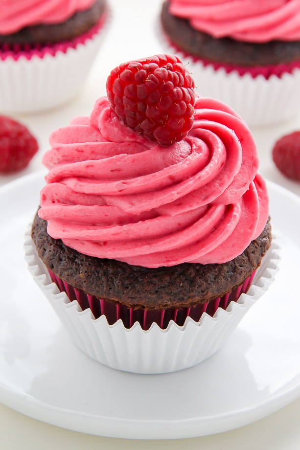 Decadent chocolate cupcakes stuffed with creamy nutella and topped with fresh raspberry frosting.