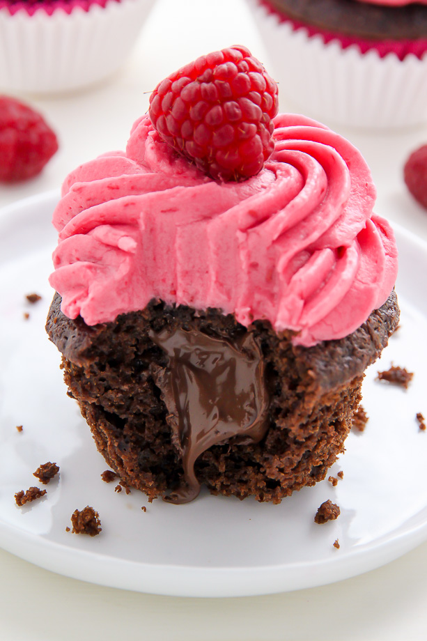 Decadent chocolate cupcakes stuffed with creamy nutella and topped with fresh raspberry frosting.