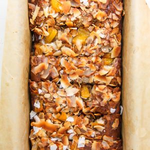 Sweet and fruity, this supremely moist banana bread is bursting with tropical flavors.